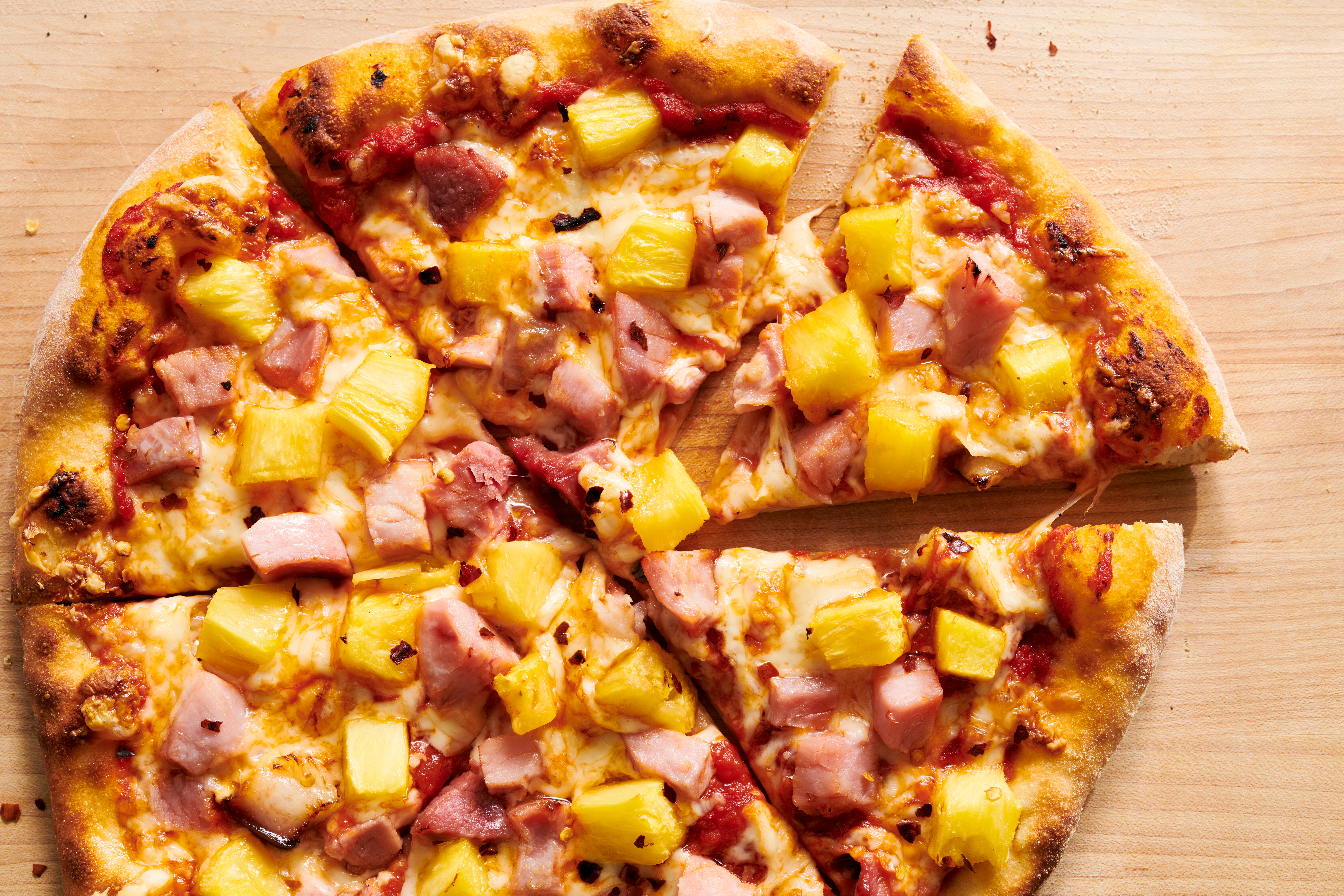 Hawaiian pizza with pineapple and ham